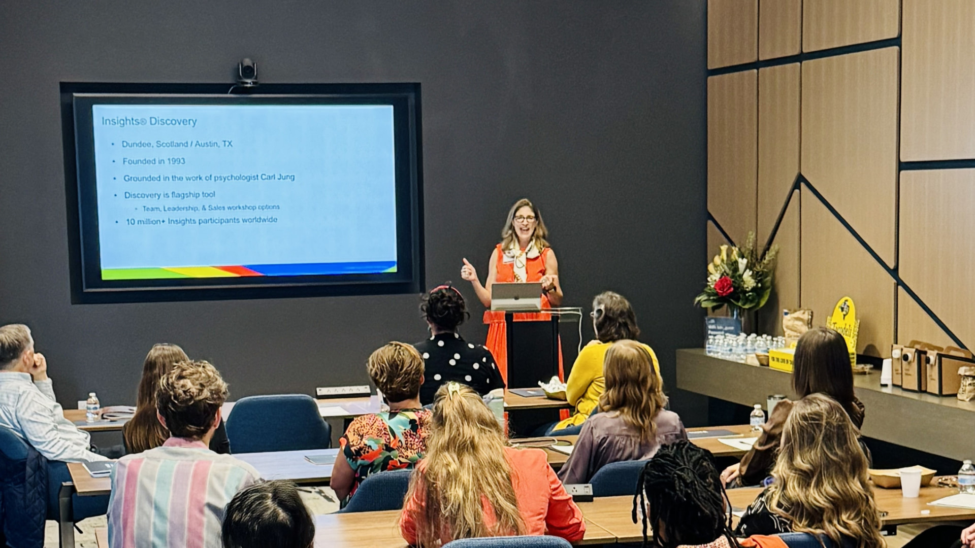 Christa Tuttle leading an Insights Discovery session for a room of nonprofit leaders